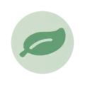 Icoon met een groen blad dat de vermindering van CO₂ en een duurzame evenementenlocatie symboliseert
